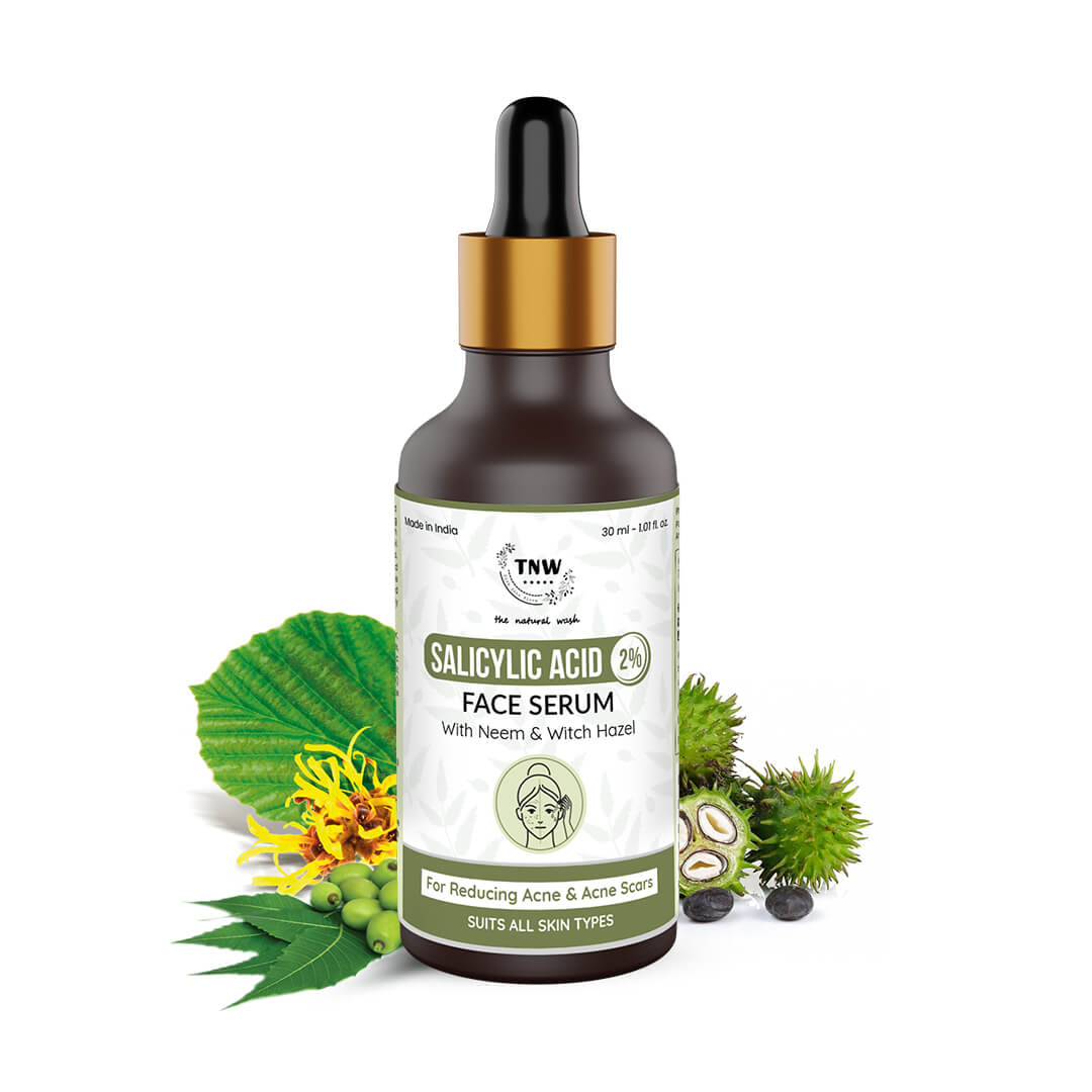 A bottle of salicylic acid face serum with a dropper, surrounded by botanical elements, indicating it is a skincare product.